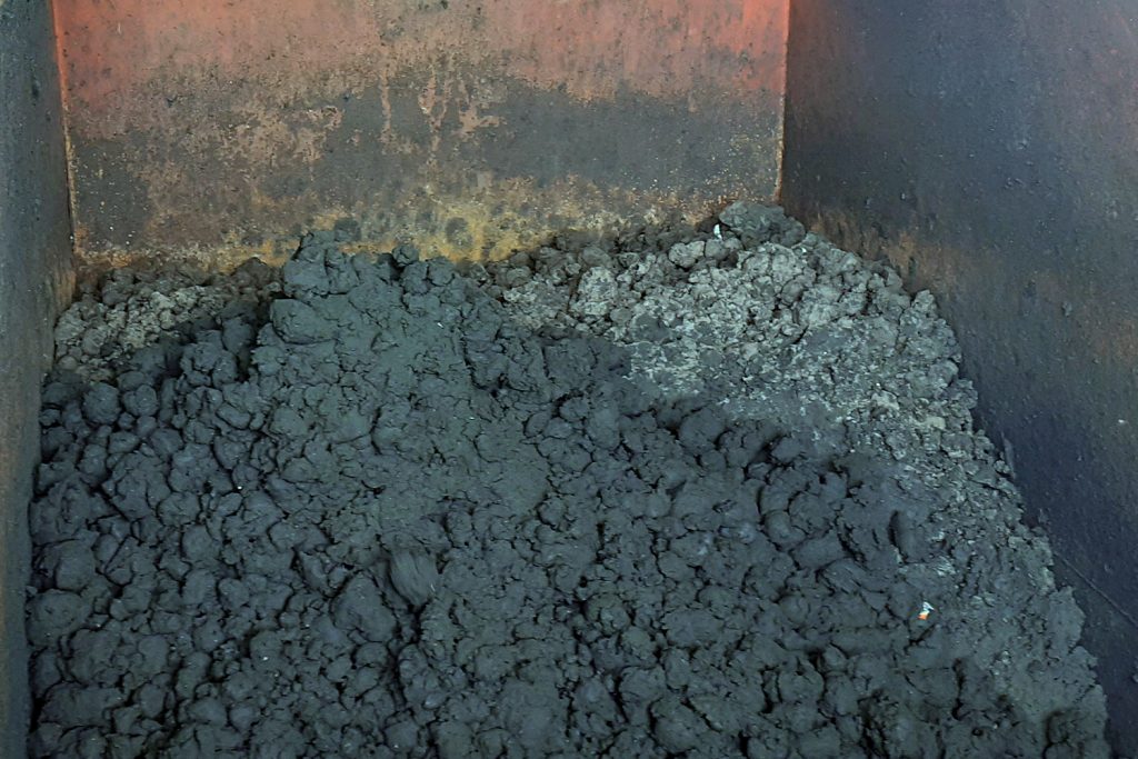 dried sewage sludge from wastewater treatment plant.